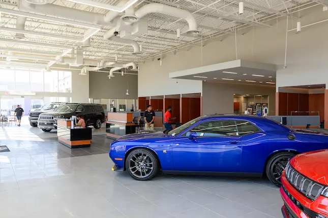 Showroom with blue car on display