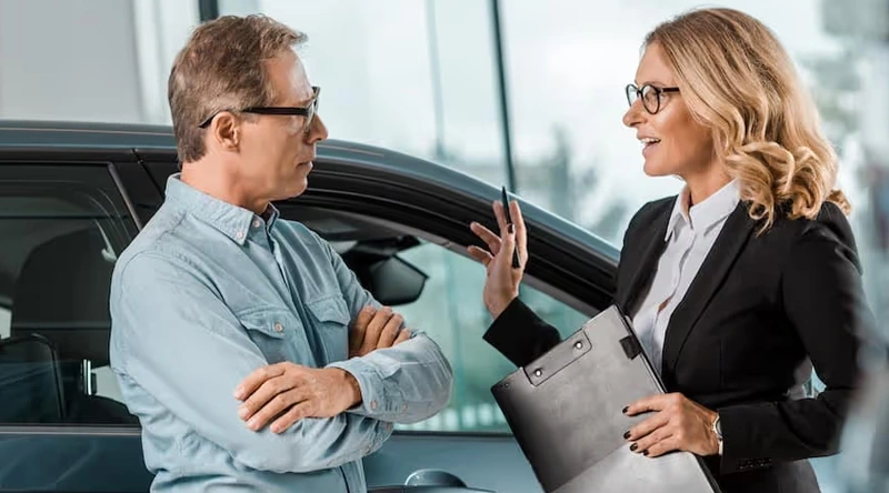 Happy customer buying a vehicle