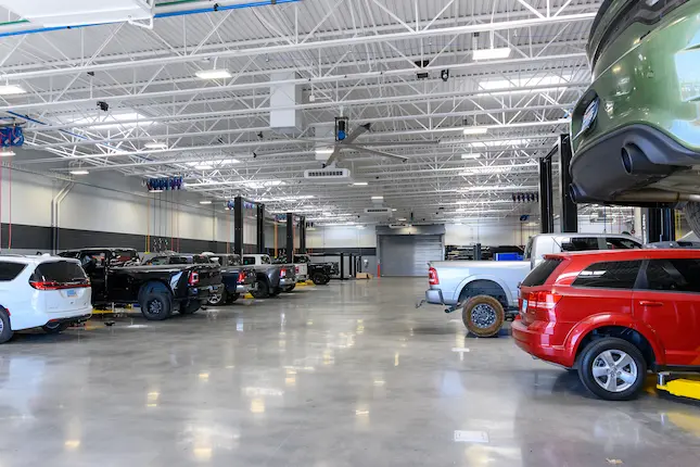 Service department with vehicles in service bays